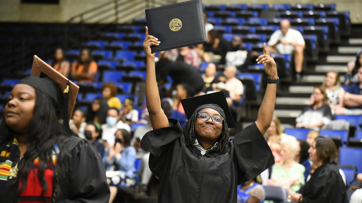 Students celebrate graduation during the 51st annual UIS Commencement